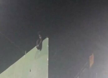 Vizag: Youth climbs hoarding and threatens suicide, rescued after four hours