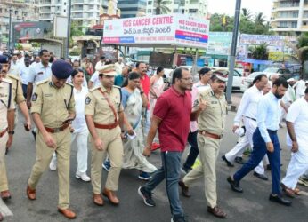 Vizagites walk spreading message on helmet use